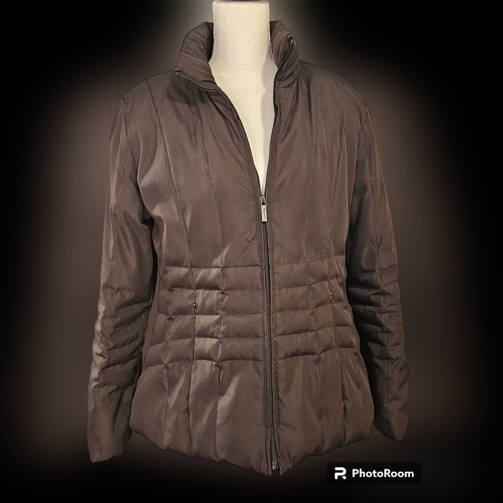 Calvin Klein women’s brown puffer jacket. Two front zip pockets. Size la…